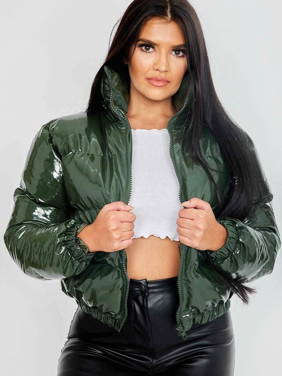 Cozy women's puffer bomber jacket. Trendy winter coat, fashionable outerwear.