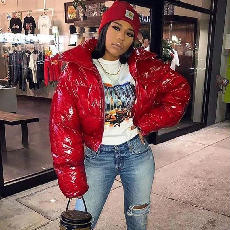 Zip-up women's puffer bomber jacket. Warm winter coat, trendy casual style.