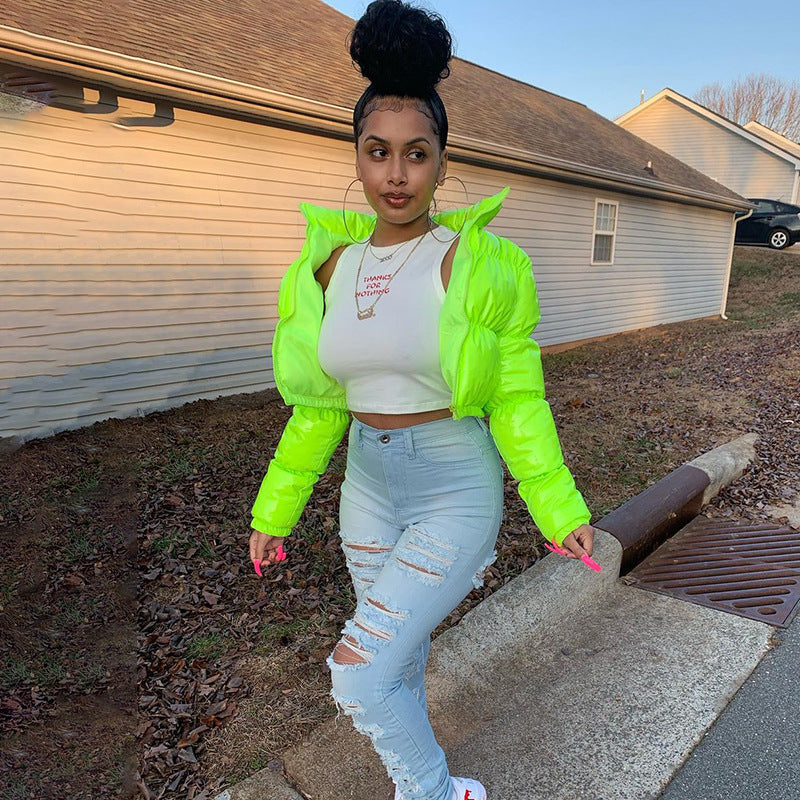 Cozy fashion women's puffer bomber jacket. Warm winter outerwear, stylish look.