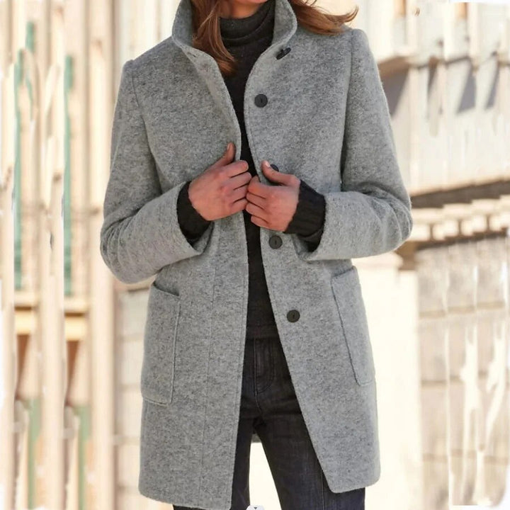 Elegant Women's High-Collar Winter Overcoat. Classic style outerwear, ideal for cold weather fashion.