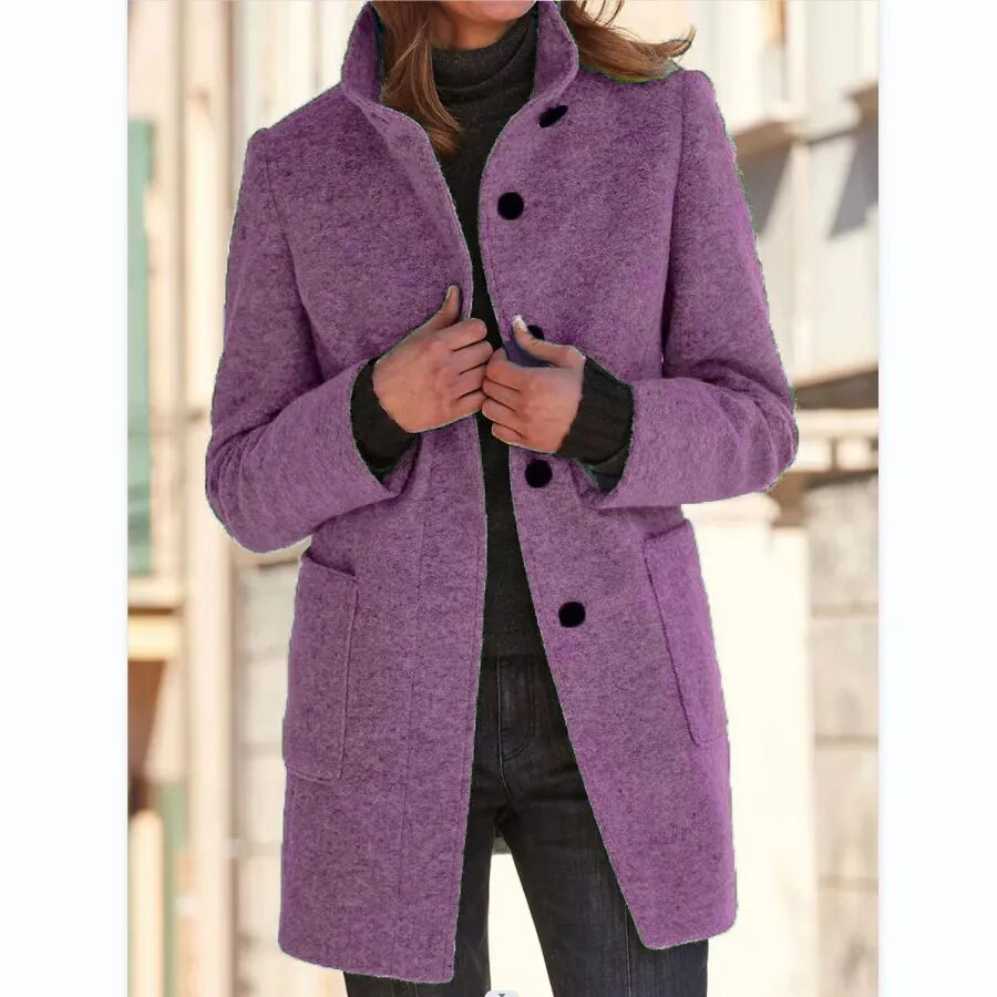 Stylish Emma high-collar winter overcoat for women. Warm button-front outerwear, elegant for cold weather fashion.