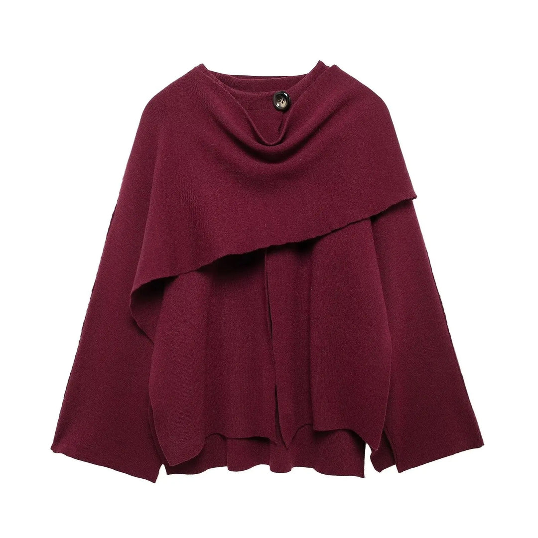 Dark blue asymmetrical women's winter poncho, a cozy and stylish outerwear option for cold days.