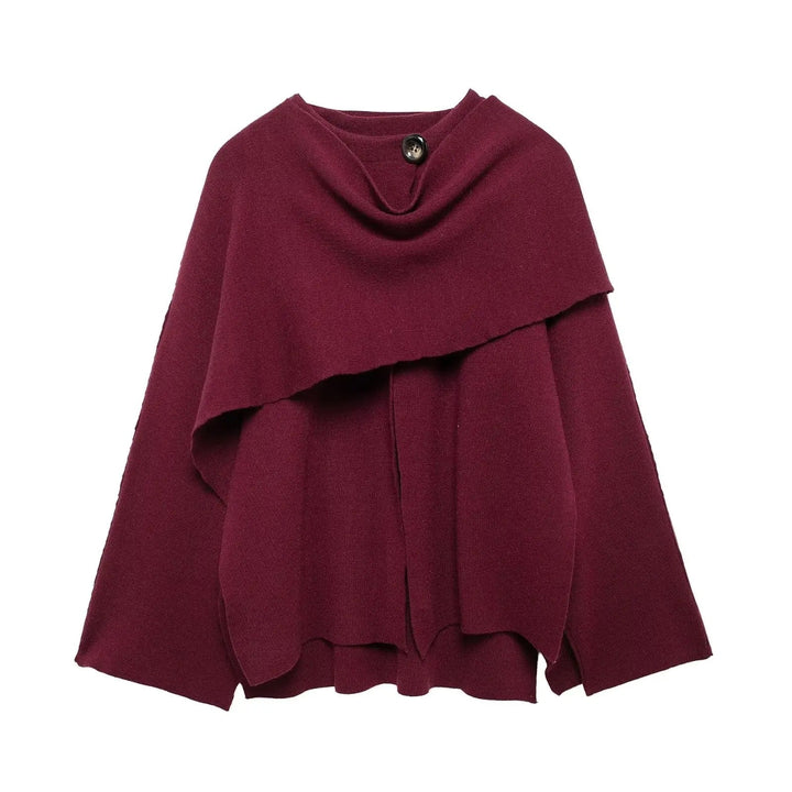 Dark blue asymmetrical women's winter poncho, a cozy and stylish outerwear option for cold days.