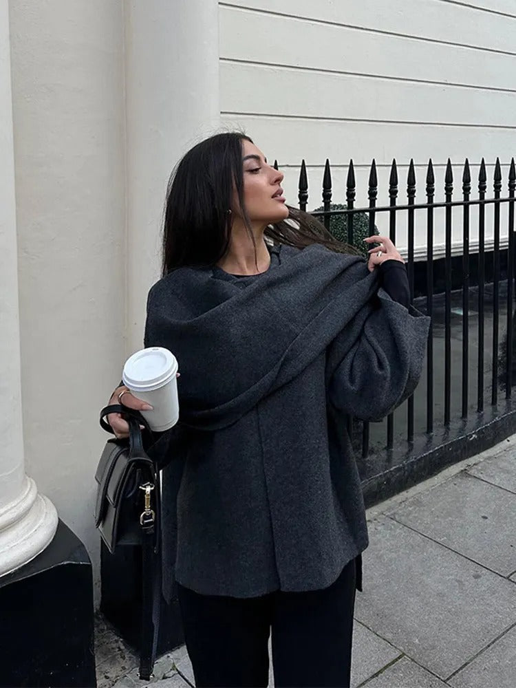 Elegant Ella asymmetrical winter poncho, a stylish outerwear piece for modern women's fall fashion.