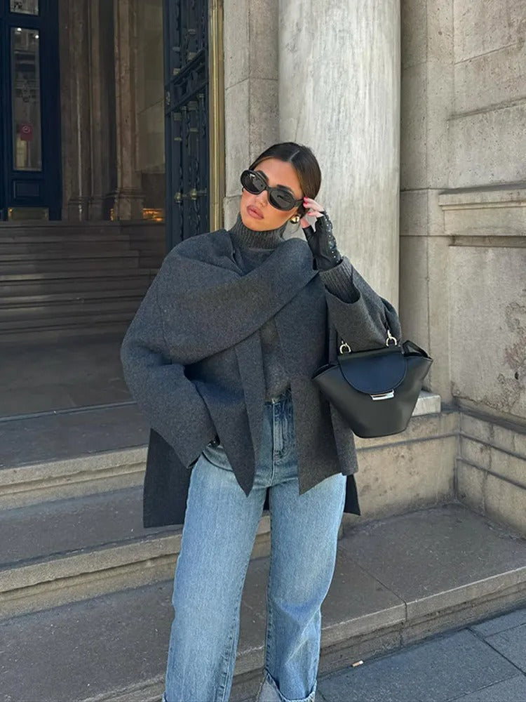 Women's warm winter poncho, asymmetrical design in dark blue, perfect for stylish fall outerwear.