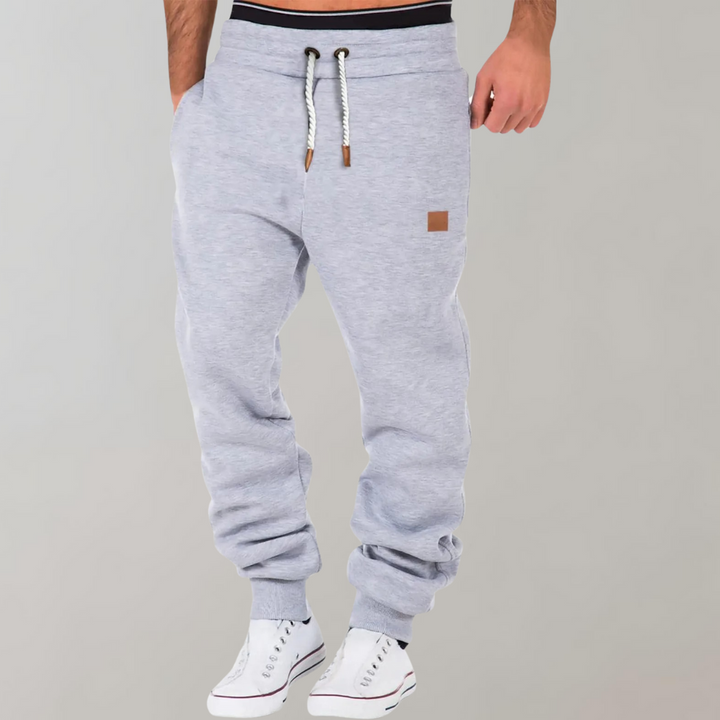 Stylish men's baggy joggers, ideal for gym workouts, lounging, or athleisure fashion.