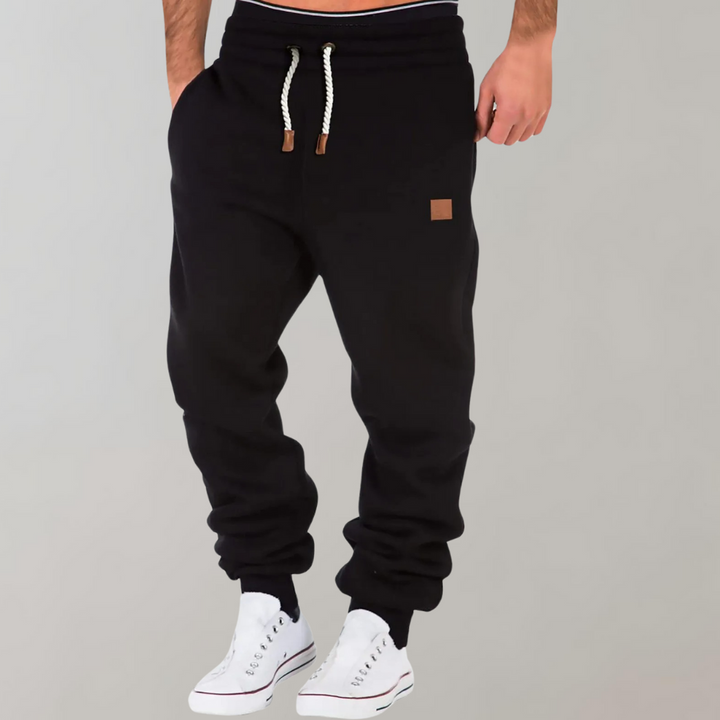 Baggy fit men's jogging pants, offering spacious comfort for casual and athletic activities.