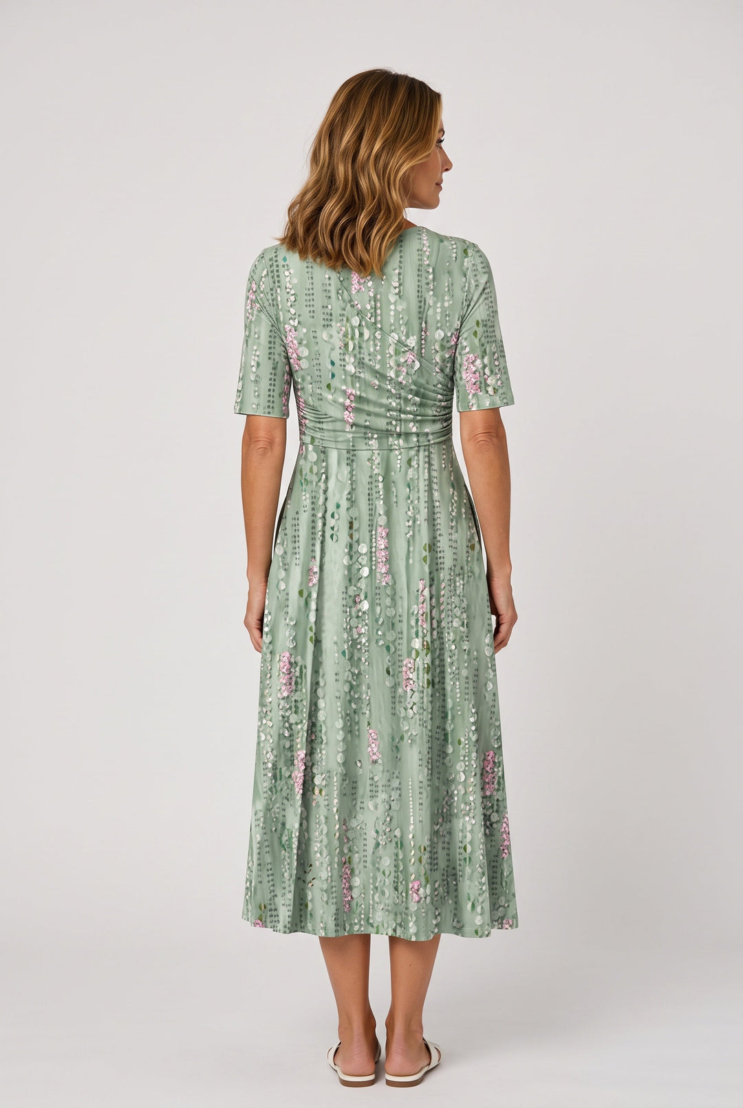 Elegant women's faux wrap midi dress in A-line style, featuring a flattering V-neck and flared skirt for a chic look.