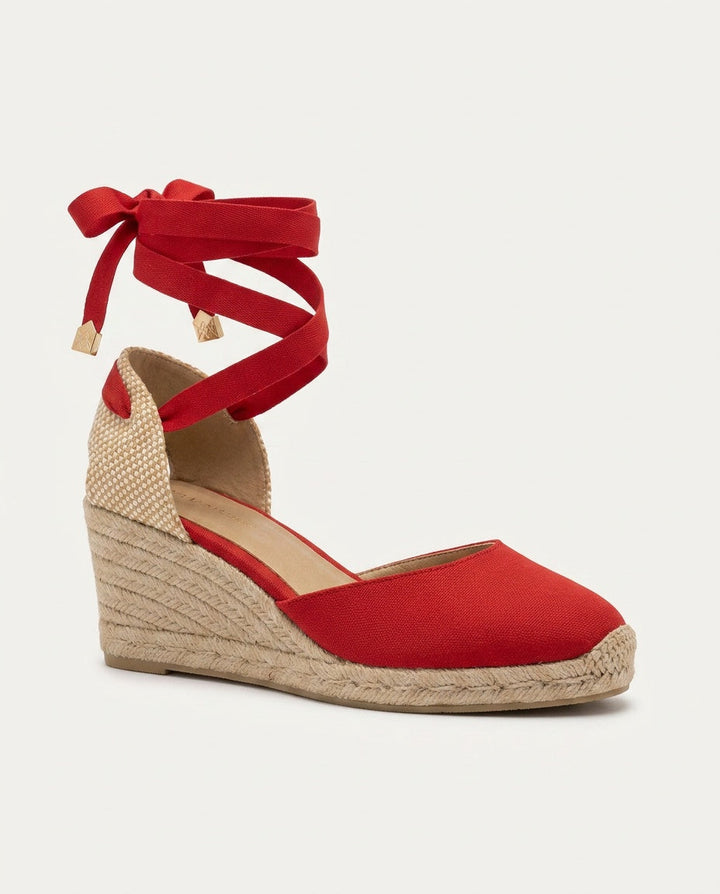 Stylish red ankle-tie espadrille wedge sandals with closed toe, elegant summer shoes for women.