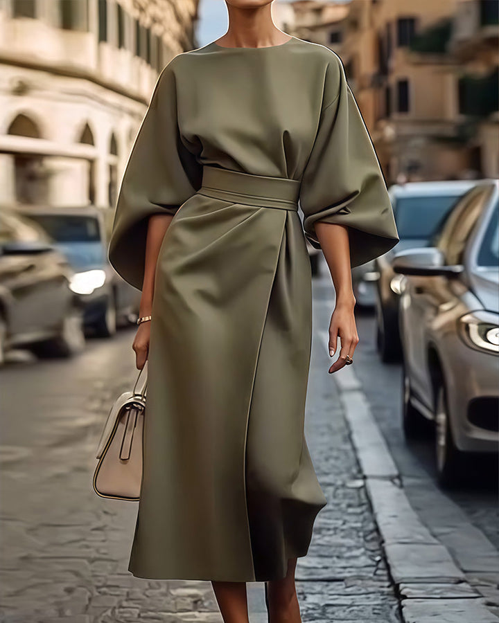 Elegant women's Celestine summer midi dress. Flattering fit, comfortable puff sleeves, versatile for any occasion.
