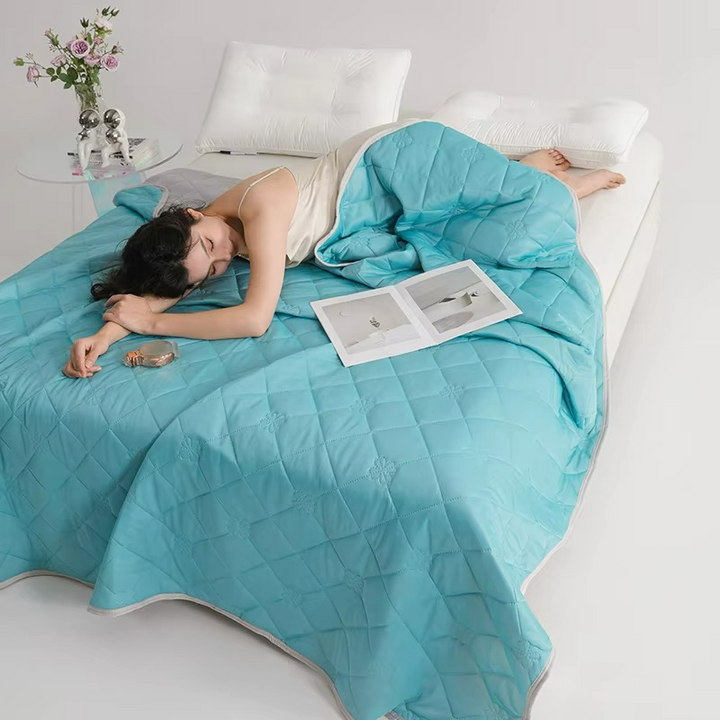 Cotton summer duvet for cool and refreshing sleep. Lightweight, breathable bedding for warm weather comfort.