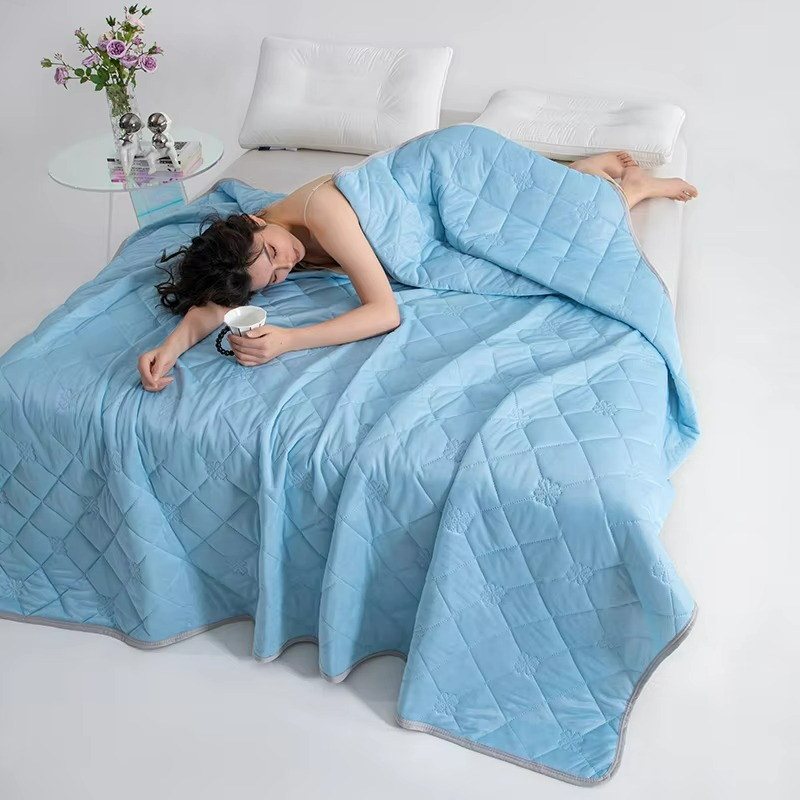 Stylish lightweight summer duvet. Breathable cotton blanket for cool, comfortable sleep. Enhances bedroom decor.