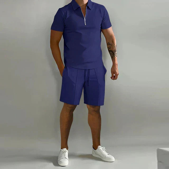 Trendy men's summer fashion set: comfortable polo shirt and matching shorts two-piece, vacation ready.