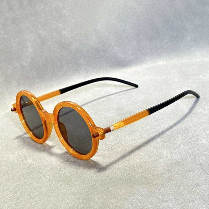 Unisex retro round sunglasses, tinted for a cool vintage look & all-season wear.