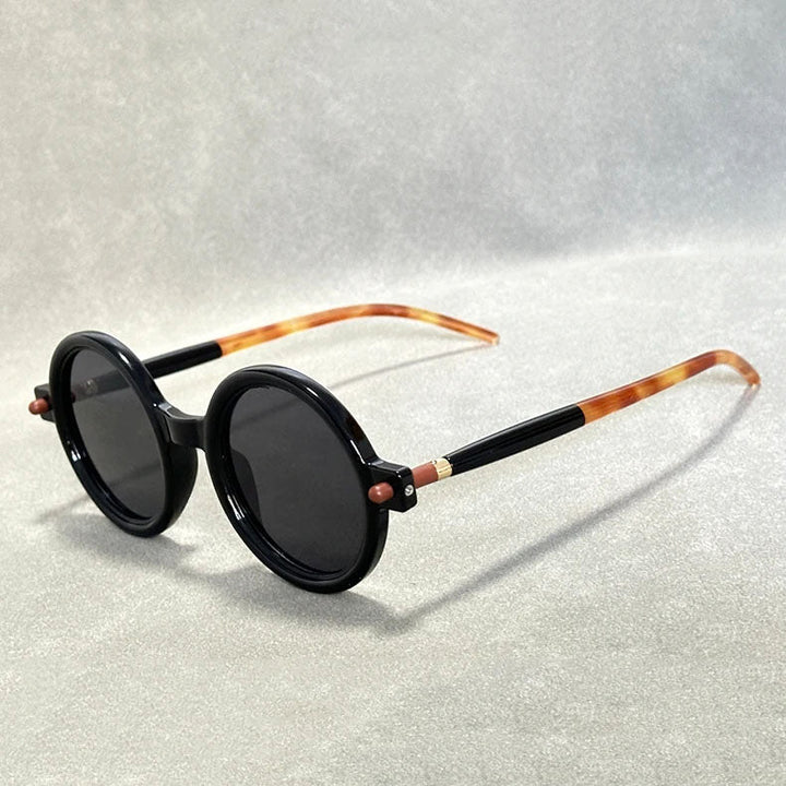 Timeless vintage round tinted sunglasses, essential unisex retro fashion accessory.