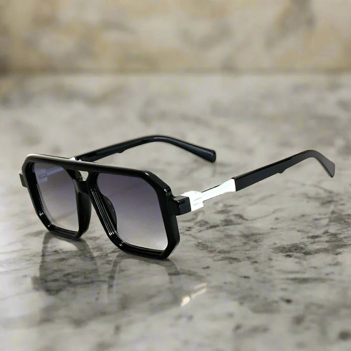 Contemporary square aviator sunglasses, unisex design, durable frame, & UV400 protective lenses.