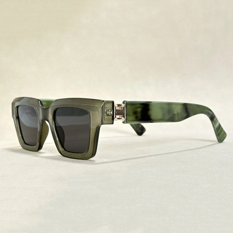 Bold retro square sunglasses for unisex fashion, featuring stylish marble print arms and frame.