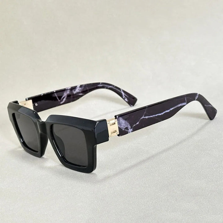 Unisex square sunglasses; retro chunky style with unique marbled effect arms; must-have accessory.