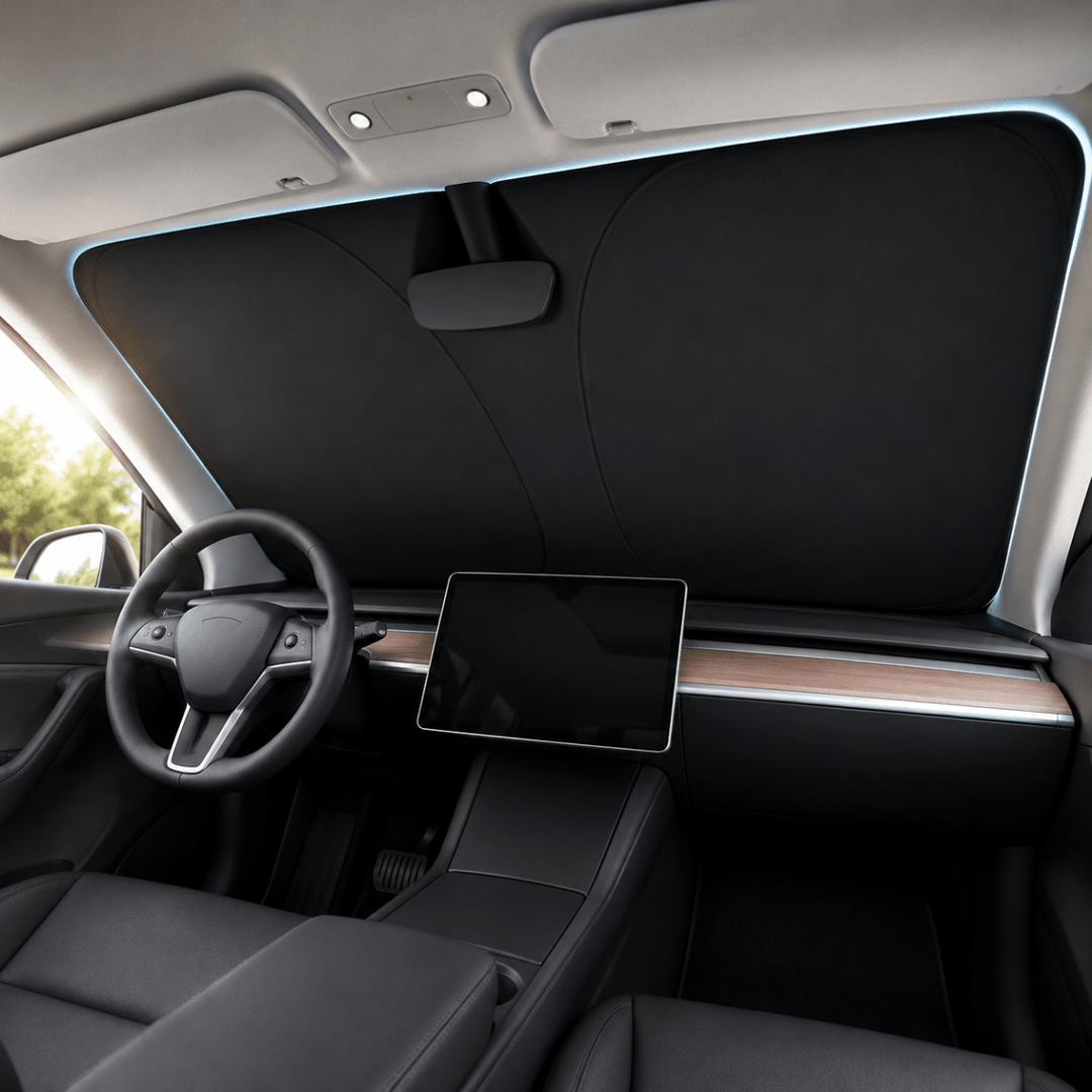 Car windshield protector reducing heat and UV damage for a cooler vehicle interior during summer driving.