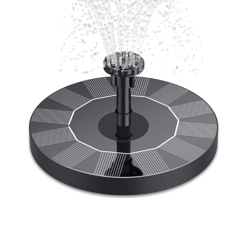 Floating solar water fountain operating in a garden pond, creating a beautiful water feature for birds and decor.