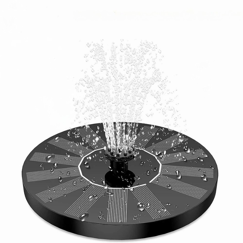 Solar bird bath fountain kit floating in a ceramic bird bath, providing a soothing water feature for garden wildlife.