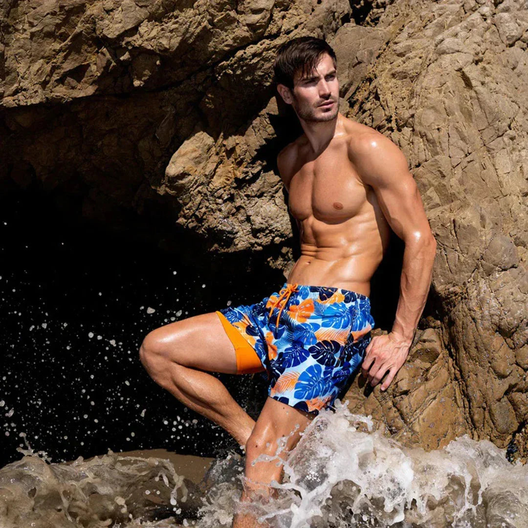 Men's quick-dry swim trunks with comfort lining, a vacation essential for summer.
