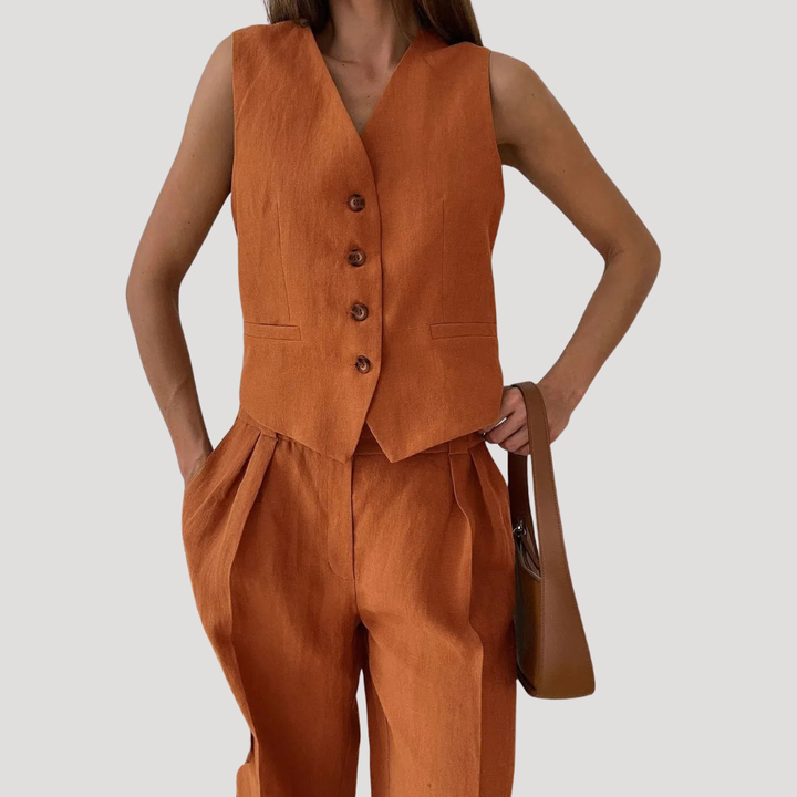 Women's chic tailored vest and wide-leg pants co-ord set, perfect for sophisticated summer fashion.