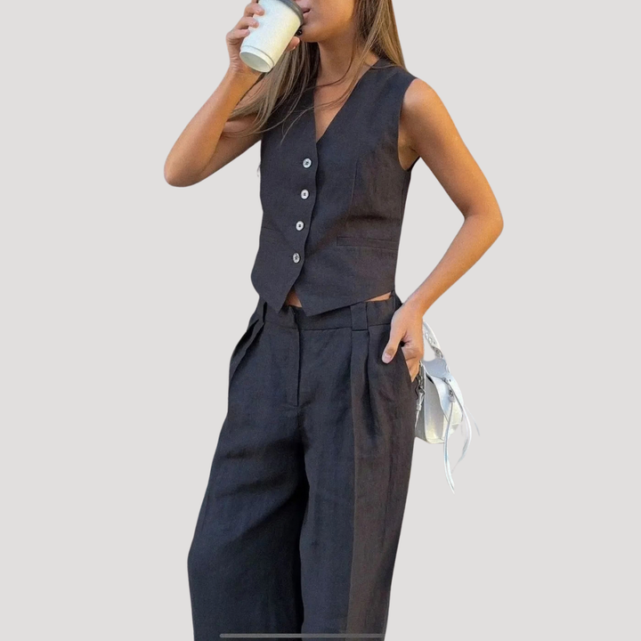 Women's sophisticated tailored vest and wide-leg pants set, offering a stylish business casual option.