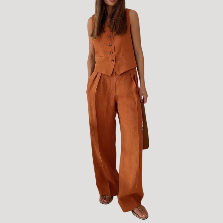 Stylish women's tailored vest & flowing wide-leg pants set, ideal for sophisticated summer wear.