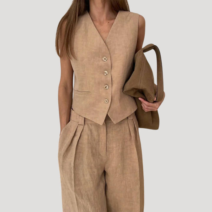 Sophisticated women's tailored vest & wide-leg pants set for business casual or elegant events.