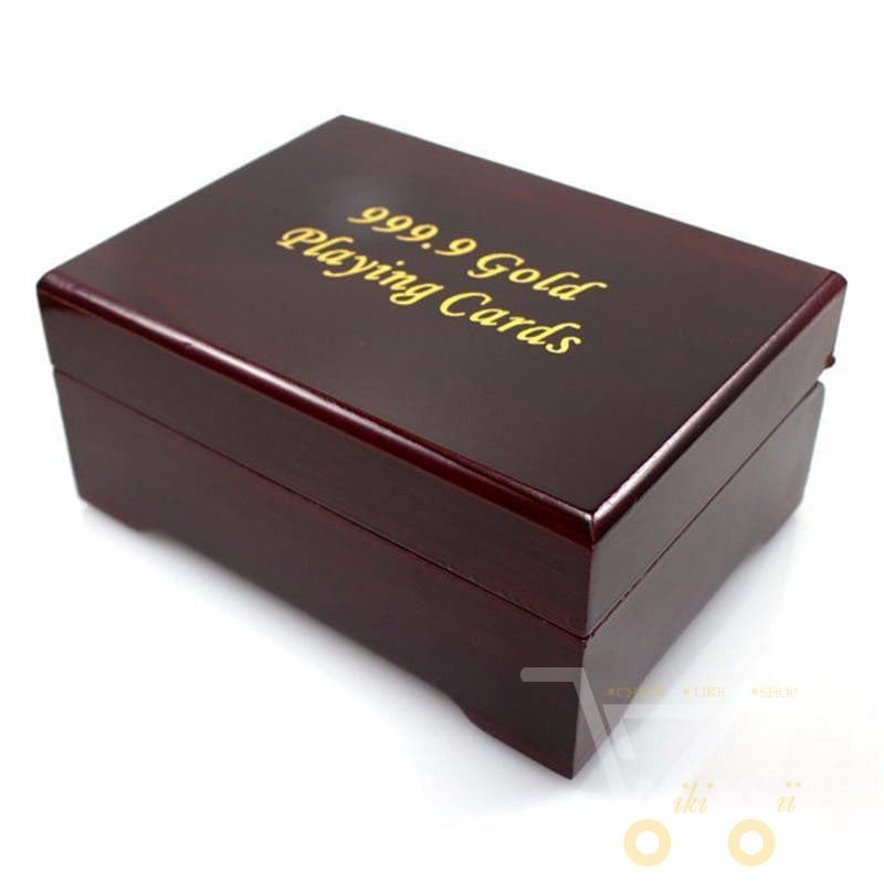 Deluxe 24K gold-plated playing card deck in a finely crafted wooden box, a unique and collectible gift.