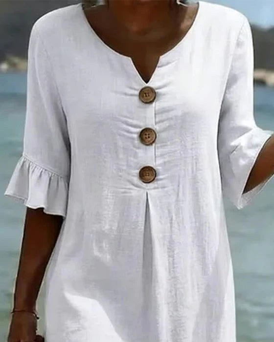Comfortable women's summer day dress with flutter sleeves & button front for warm weather.