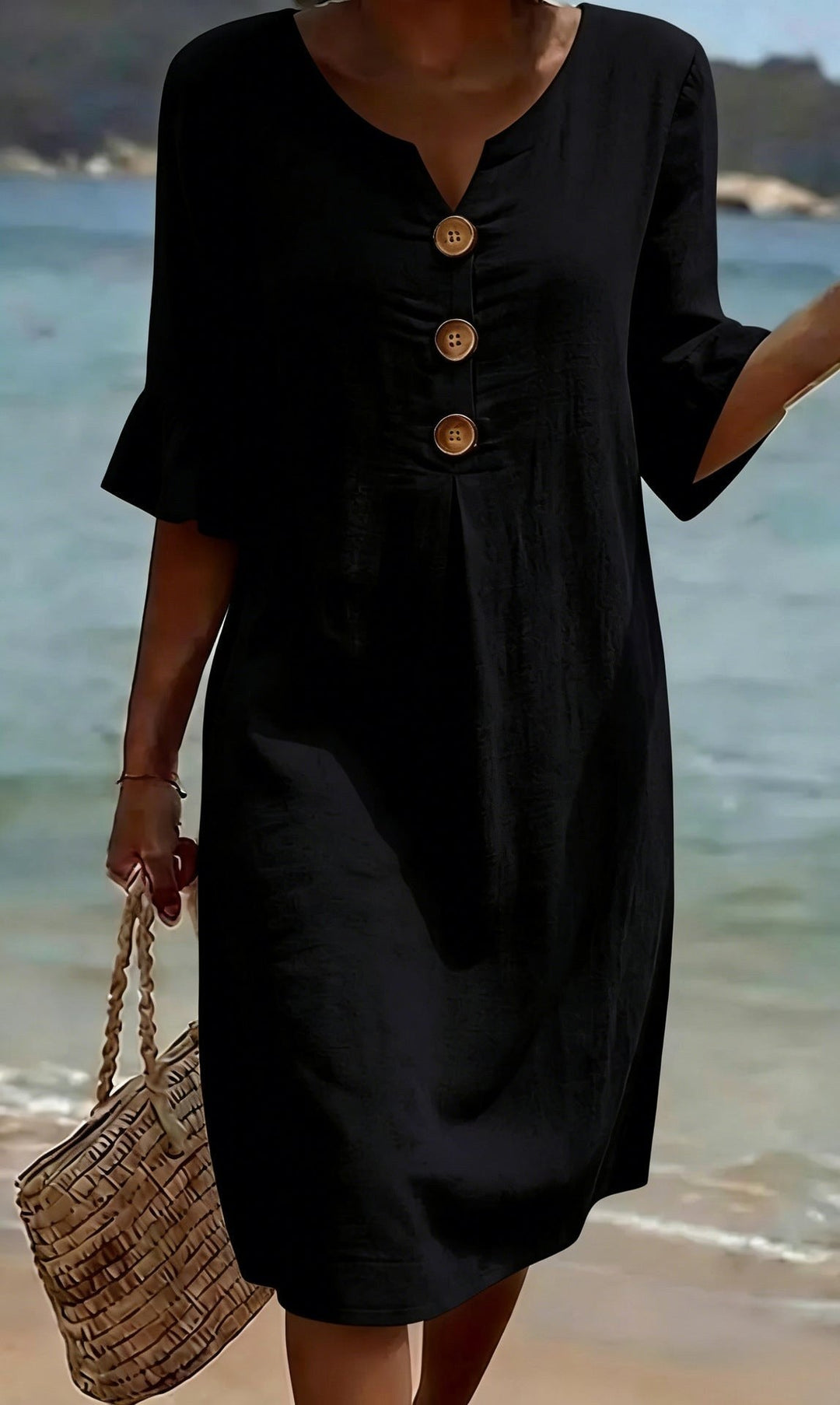 Elegant women's flutter-sleeve shirt dress, button-front design for versatile spring fashion.