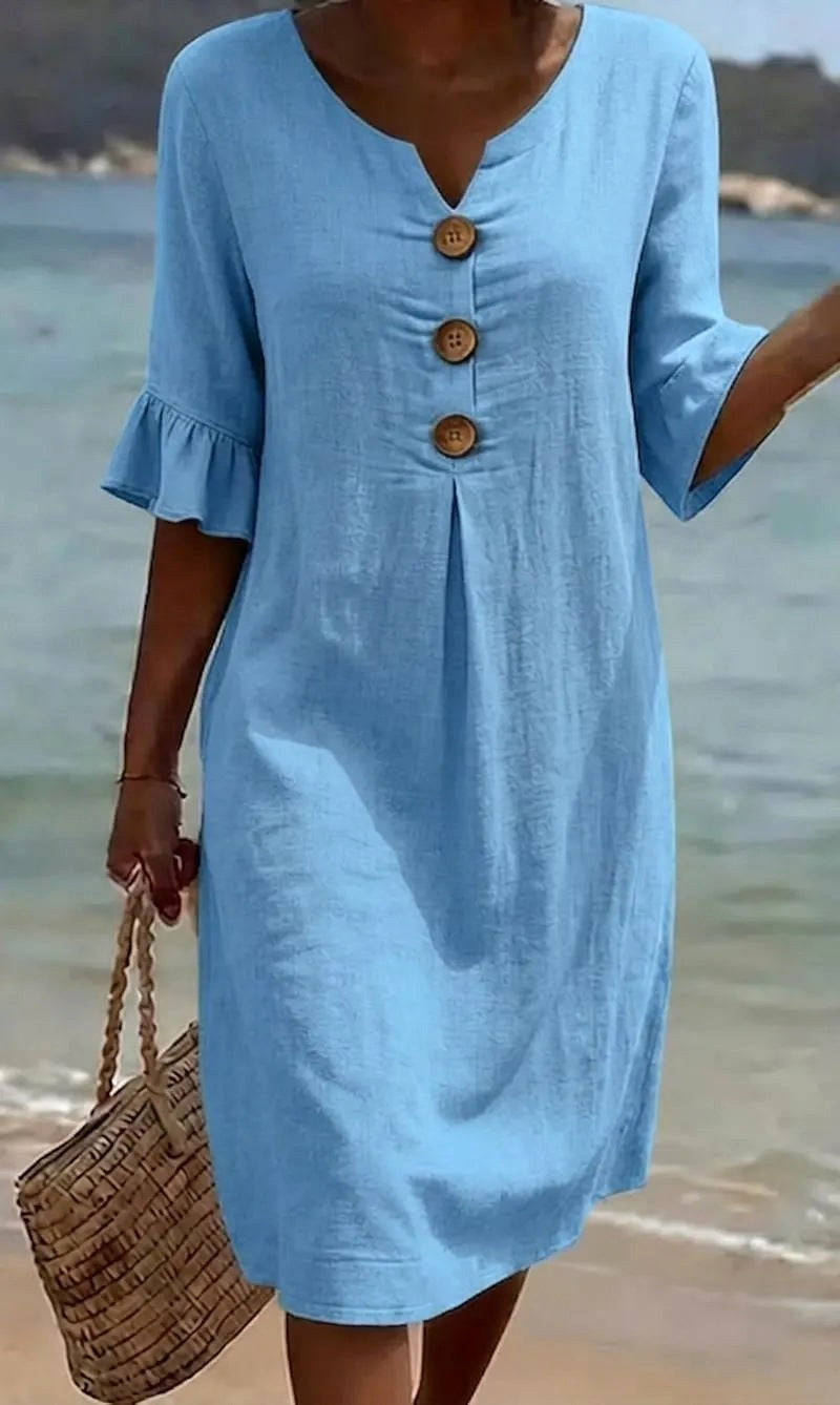 Casual women's button-front shirt dress with flowy flutter sleeves for relaxed summer days.