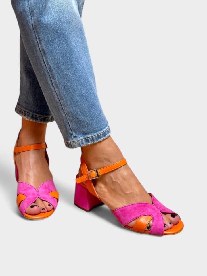 Stylish women's court shoes with orthopedic block heels, offering all-day comfort for work or dress occasions.