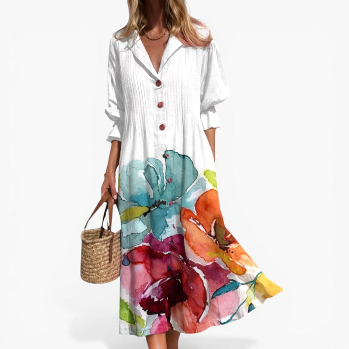Flowy midi shirt dress for women, featuring a comfortable relaxed fit, eye-catching bold print, and versatile button front.