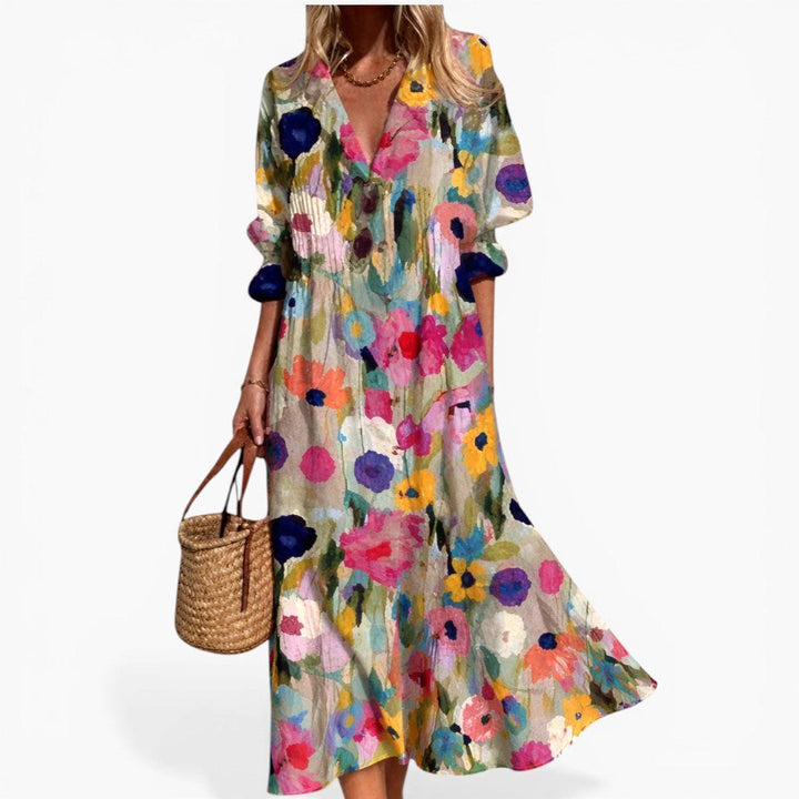 Comfortable women's day dress: Relaxed shirt style with a striking bold print, full button front, and flowy midi skirt.