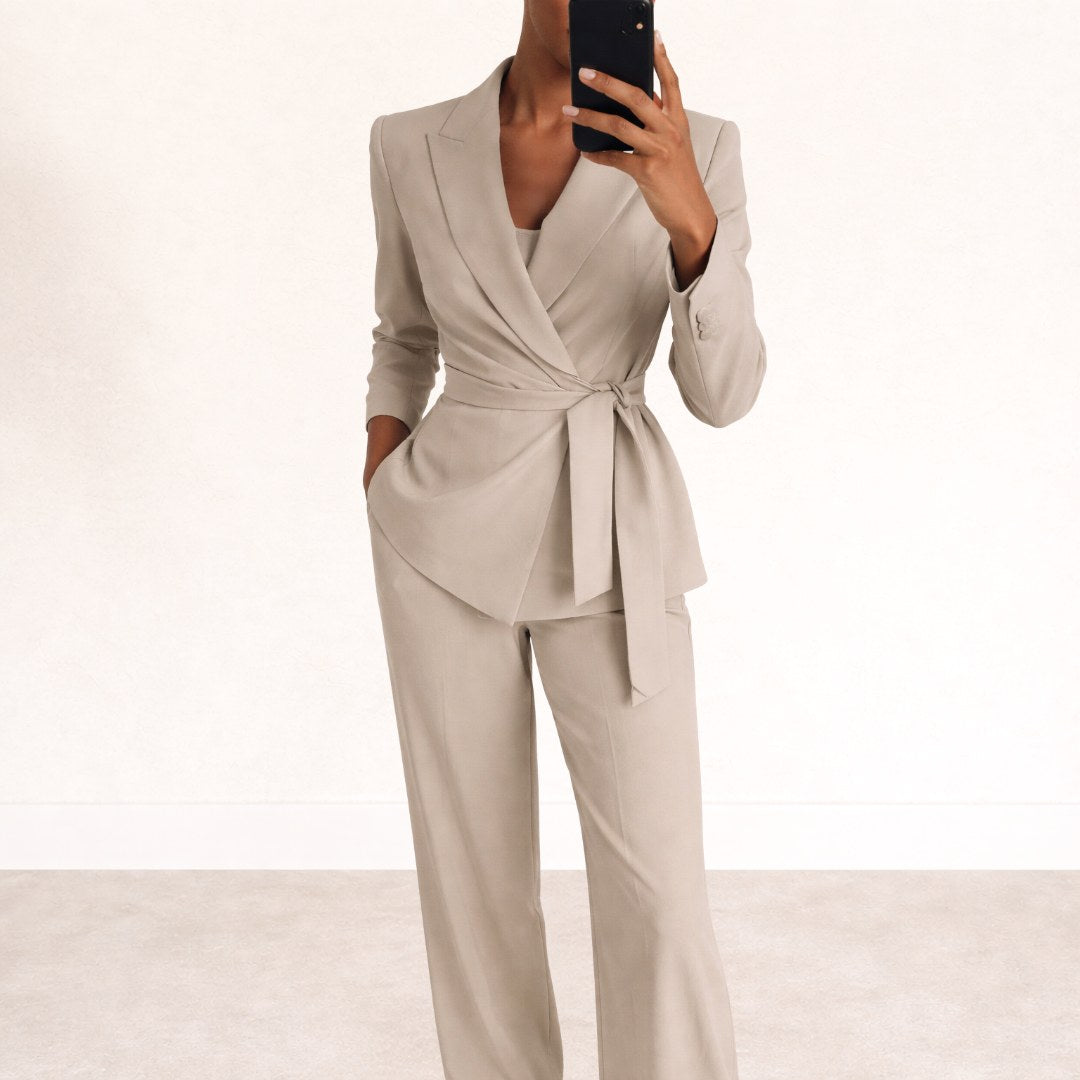 Elegant women's tailored tie-waist blazer and pant suit set, perfect for chic professional or smart casual outfits.