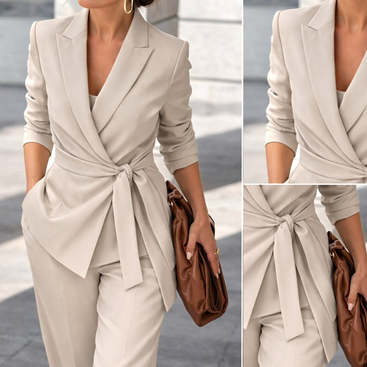 Professional women's tailored suit set with a stylish tie-waist blazer and matching trousers for elegant wear.