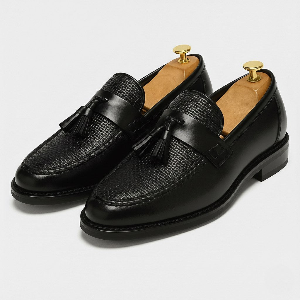 Men's classic slip-on tassel loafers in rich brown leather, perfect for refined style & comfortable wear.