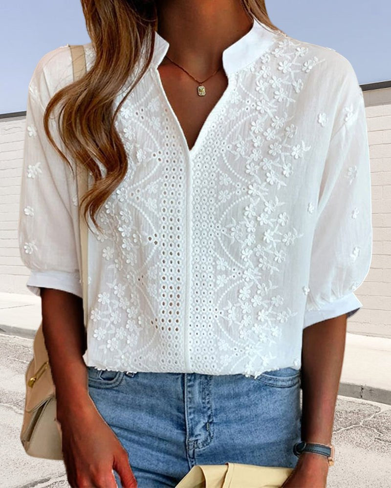 Elegant flowing women's blouse, perfect for casual everyday style. Comfortable & versatile chic top.