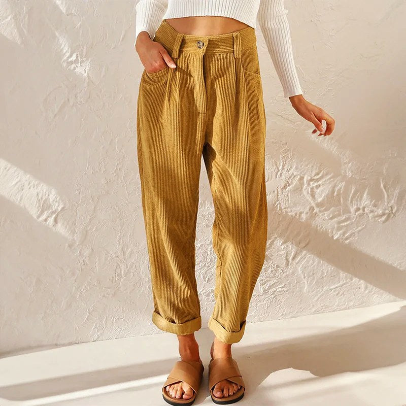 Women's high-waist wide-leg pleated trousers, perfect for stylish office wear or casual comfort.