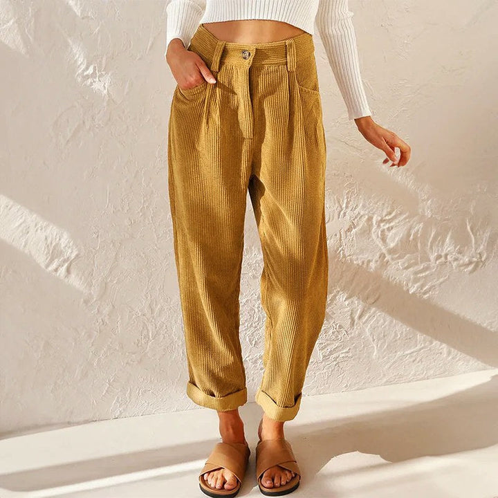 Women's high-waist wide-leg pleated trousers, perfect for stylish office wear or casual comfort.