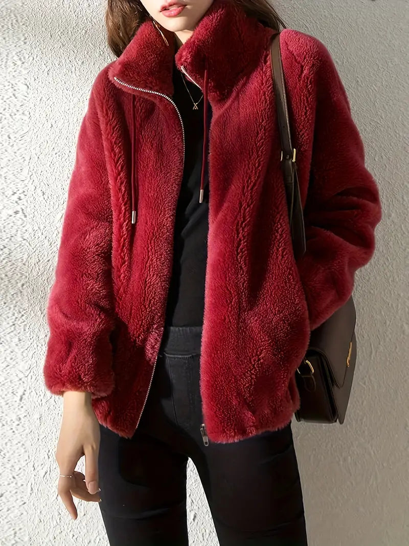 Warm women's Isla Teddy Coat: plush winter jacket with drawstring & zipper for cozy cold weather outerwear.