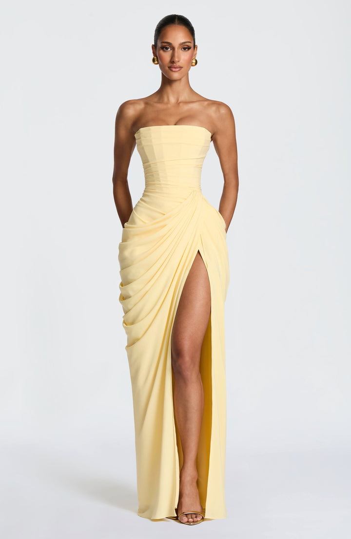 Elegant women's strapless maxi evening dress with a sophisticated sculpted bodice, perfect for formal events.