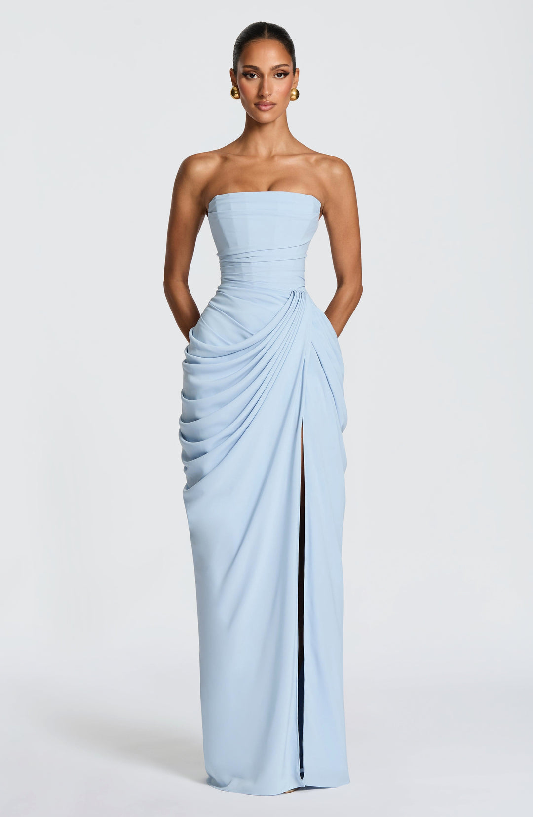 Women's formal maxi dress, strapless with a sculpted bodice. Ideal for evening parties & special occasions.