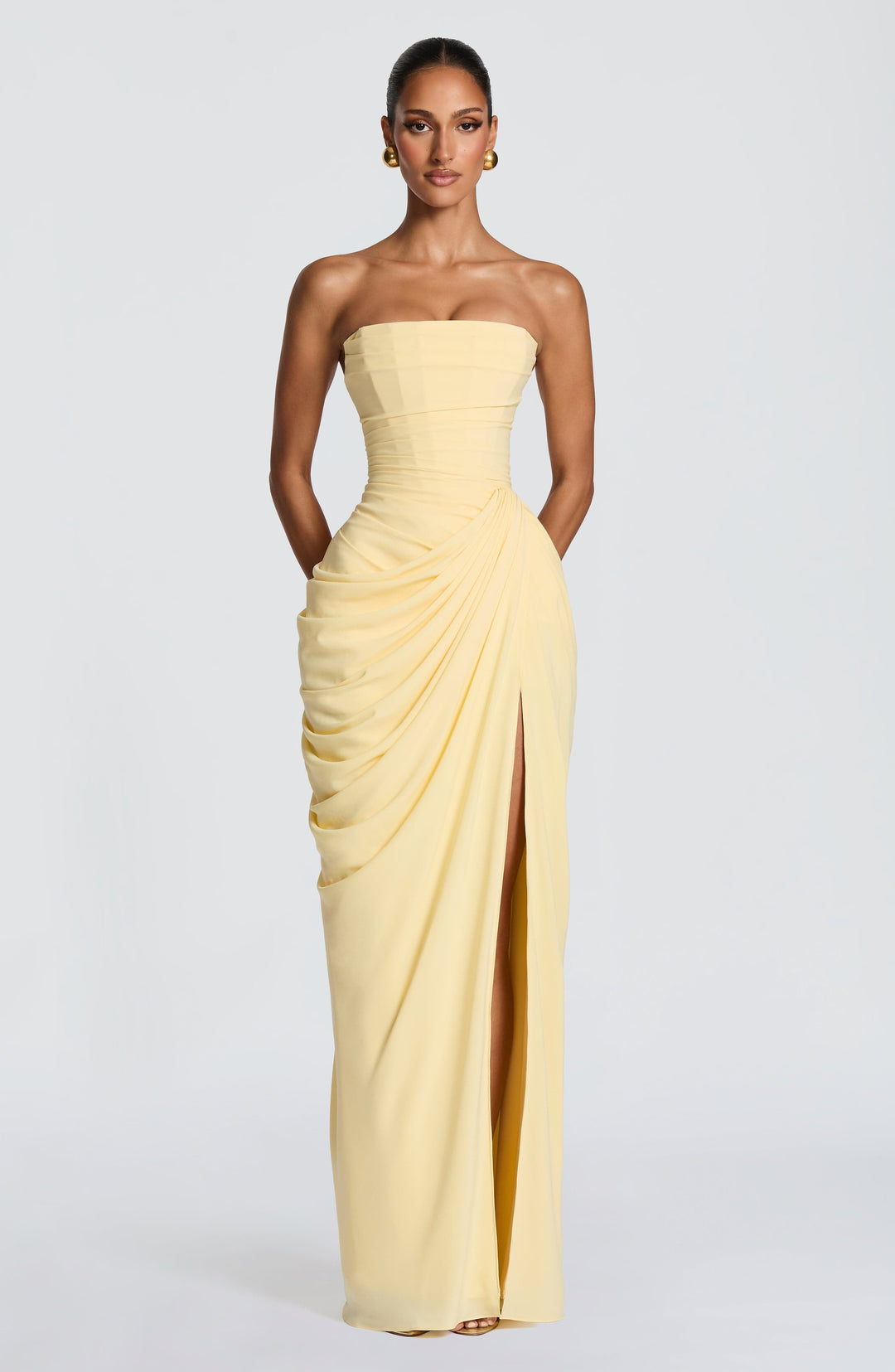 Sophisticated women's strapless maxi dress, elegant sculpted bodice for formal occasions and evening parties.