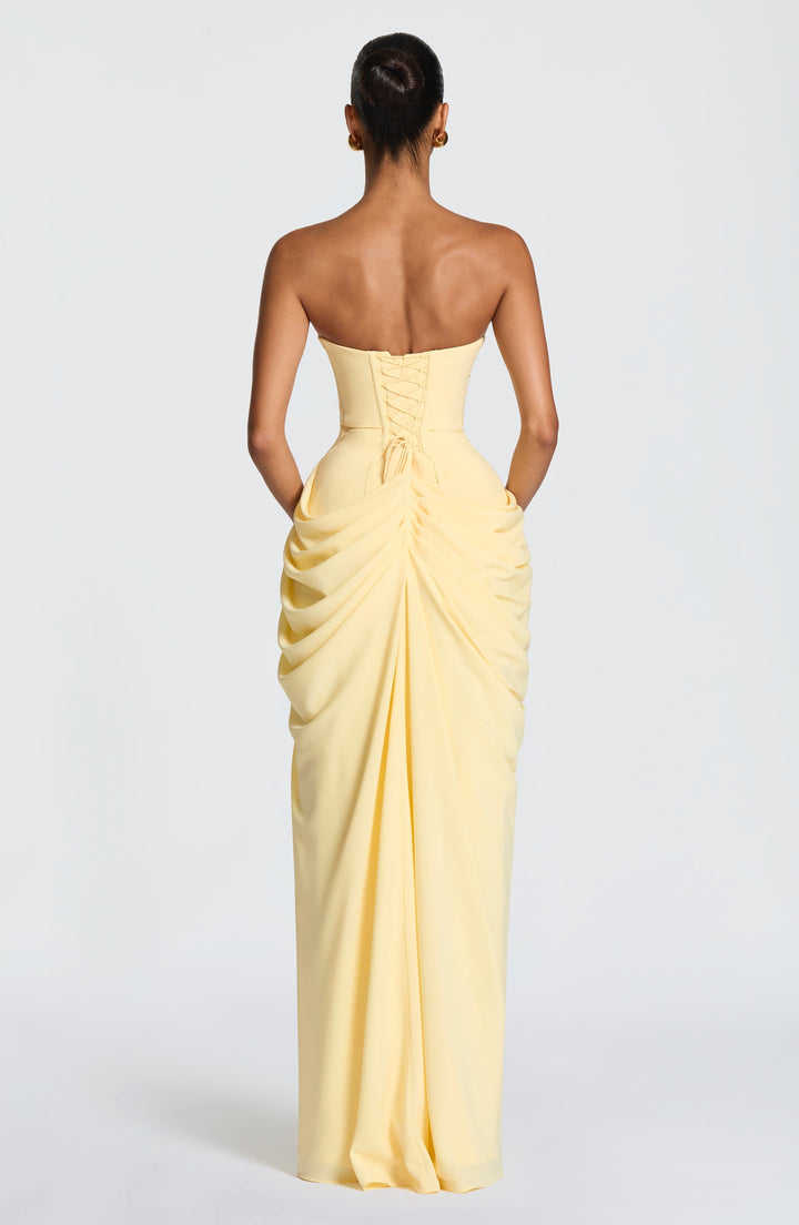 Chic women's strapless maxi evening dress, elegant design with a sculpted bodice for a memorable formal event.