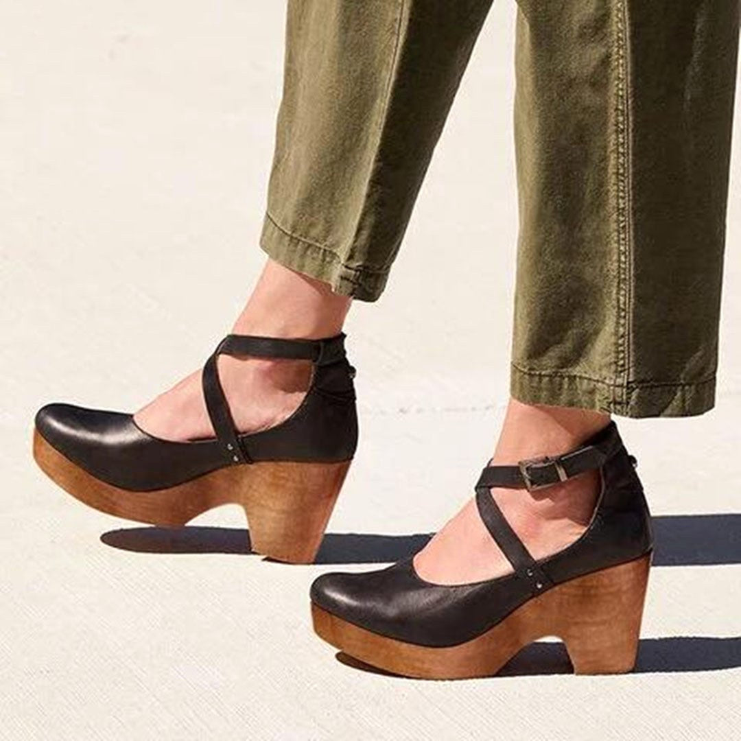 Elegant women's closed-toe wedge heels with ankle strap, perfect for comfortable all-day wear & versatile styling.