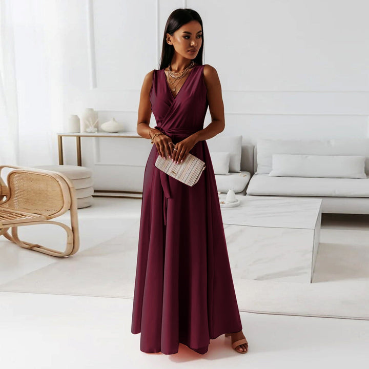 Sleeveless women's wrap maxi dress with adjustable waist. Effortless summer fashion & elegant style for any event.